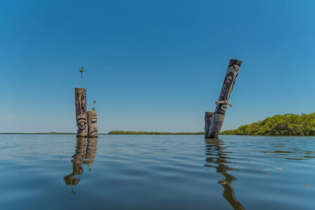 Tikis behind Sandy hook Matlacha